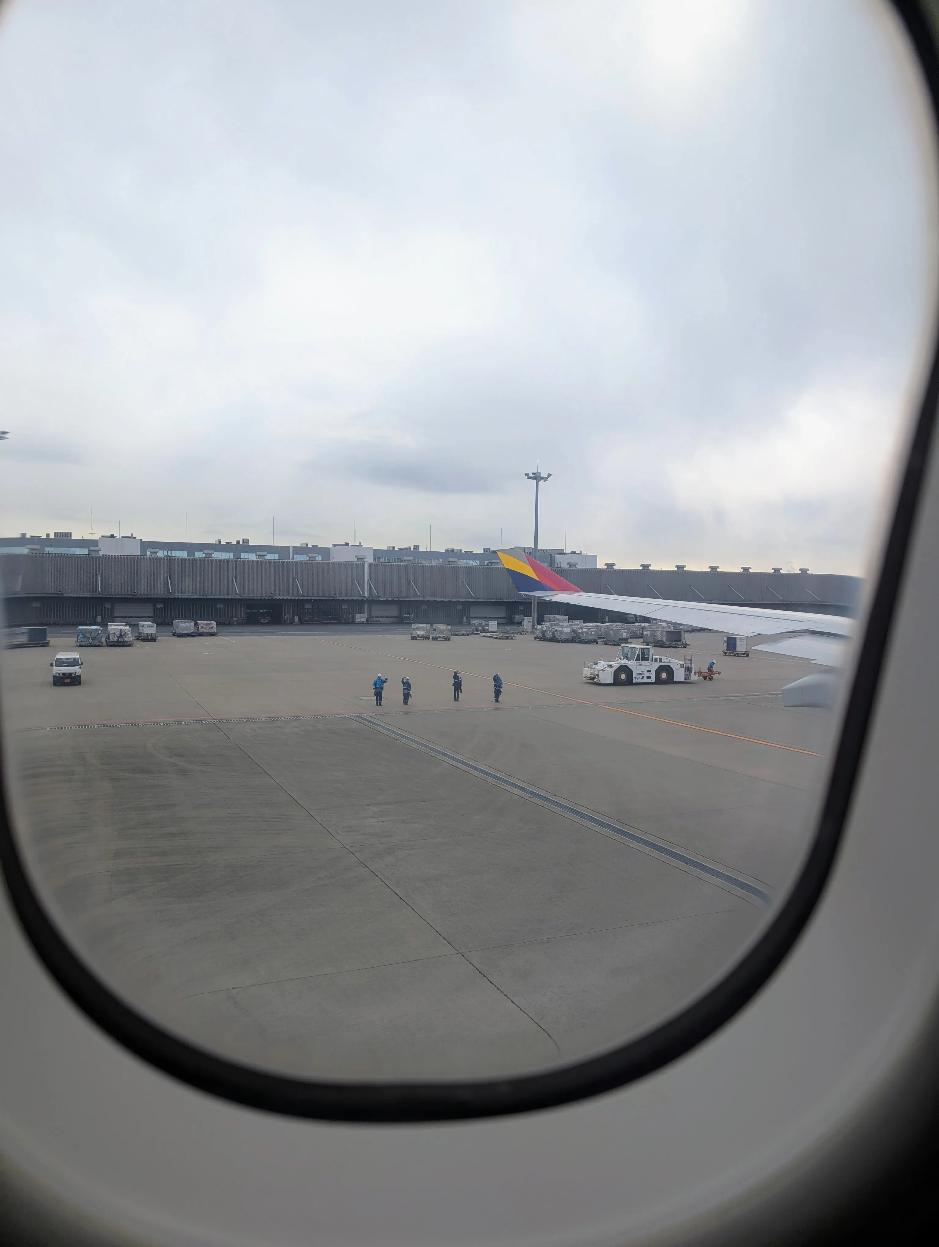 Ground crew waving to the airplane