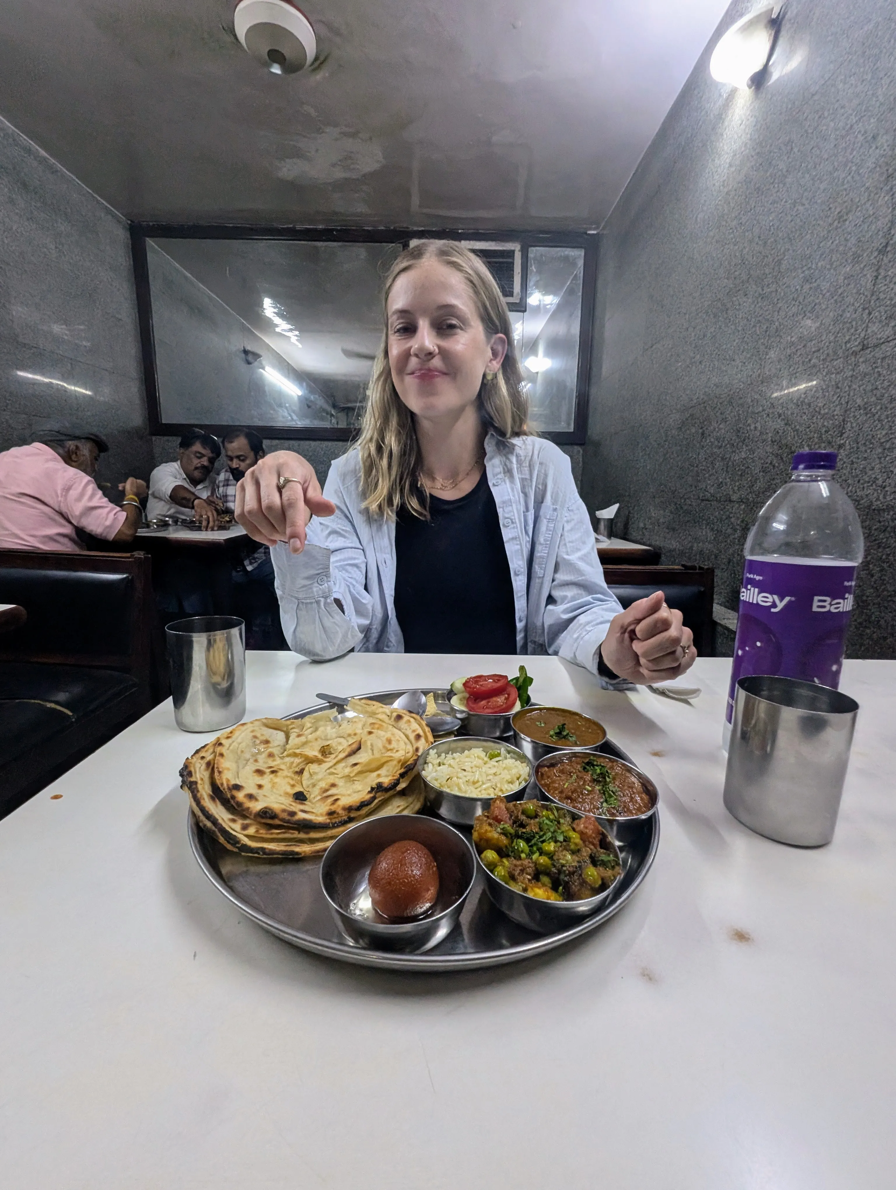 Makeda with the thali at Mohan restaurant in Jaipur. The lachha paratha was the best of the trip.