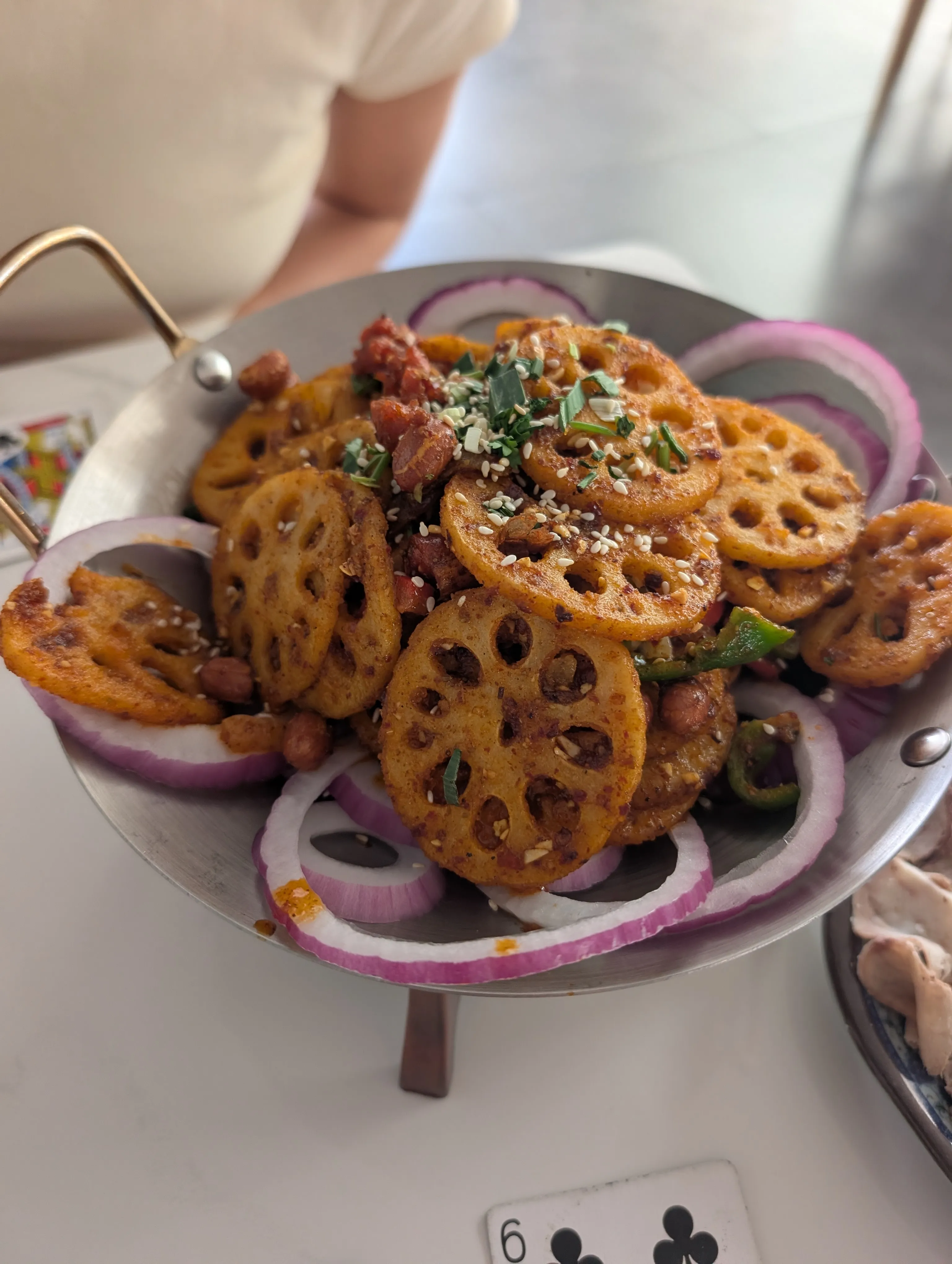 Stir-fried lotus root with chili and black vinegar.