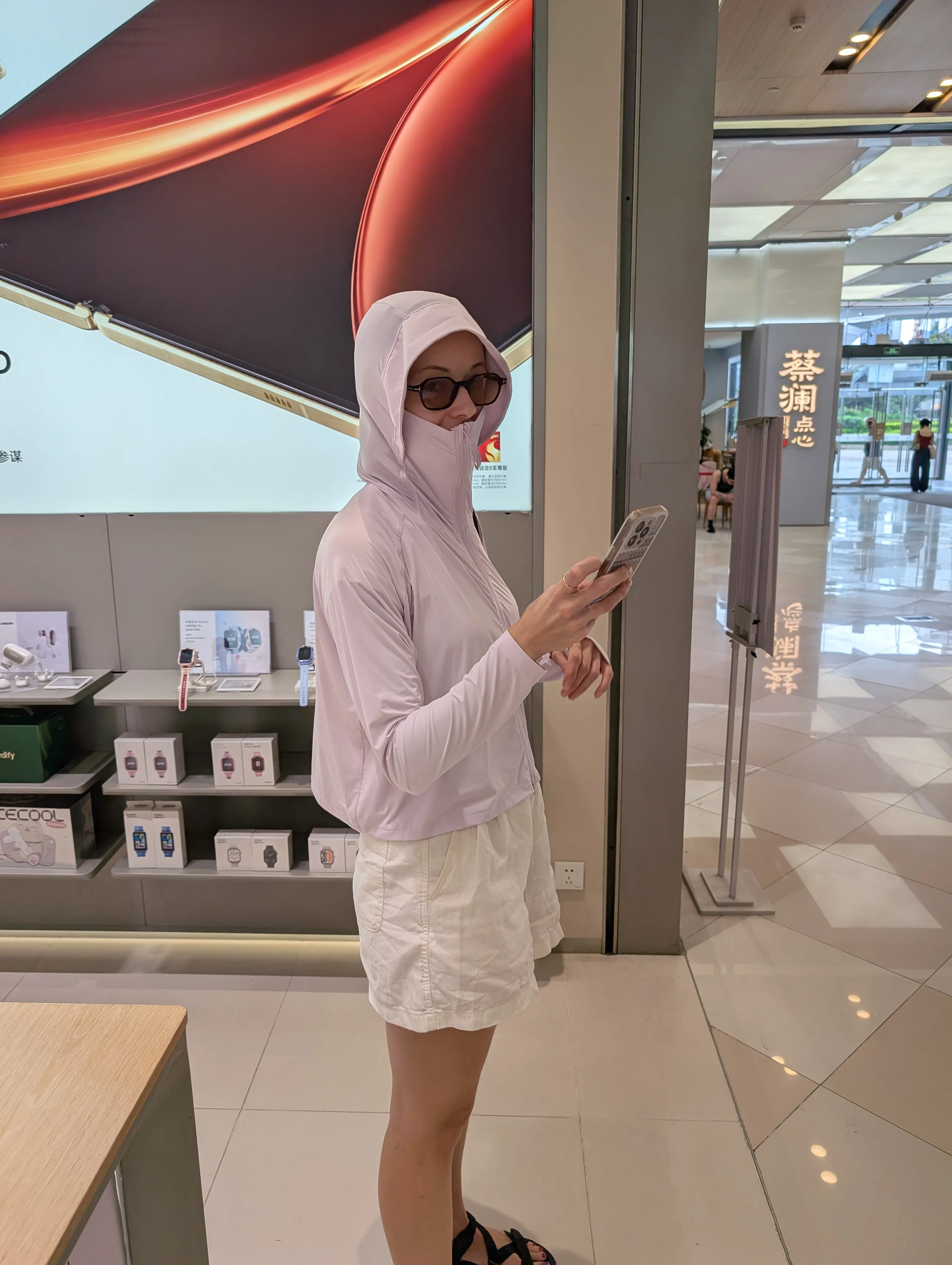 Makeda in a sun hoodie