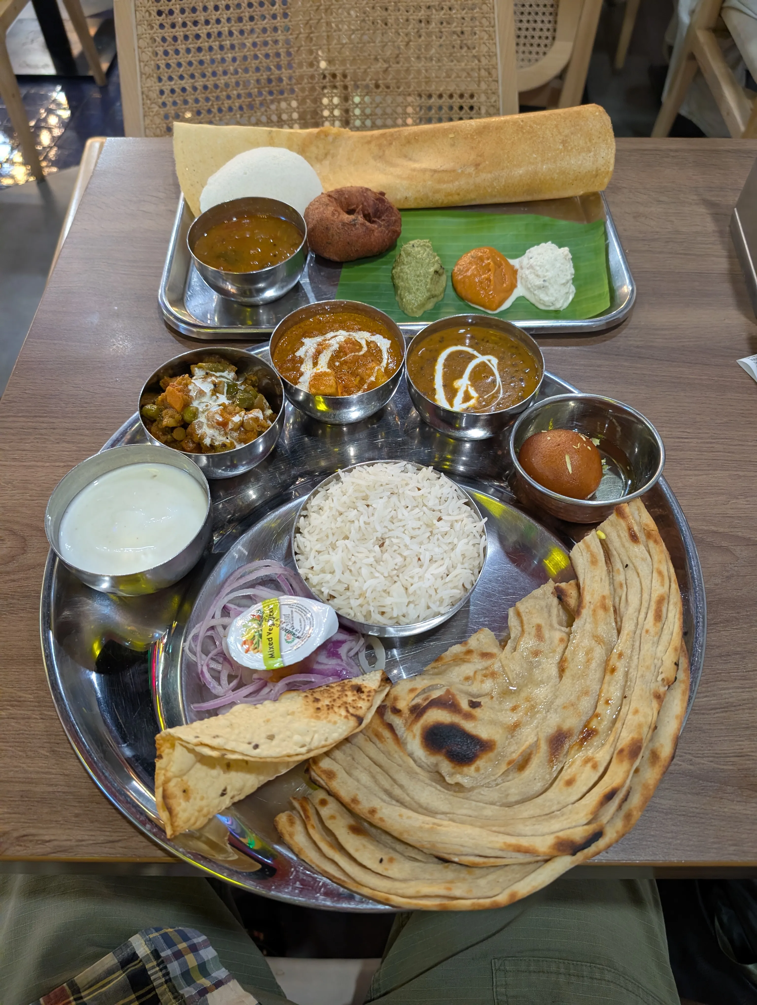 North and south in one sitting: a full thali and a dosa with all the accompaniments.